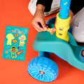 kid putting stickers on cocomelon kick scooter