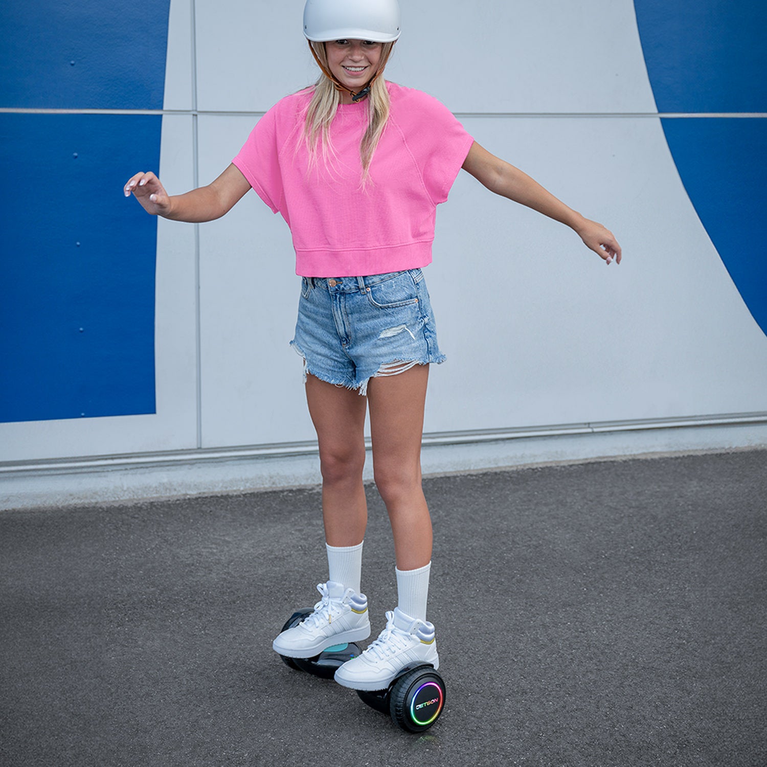 girl riding dash hoverboard