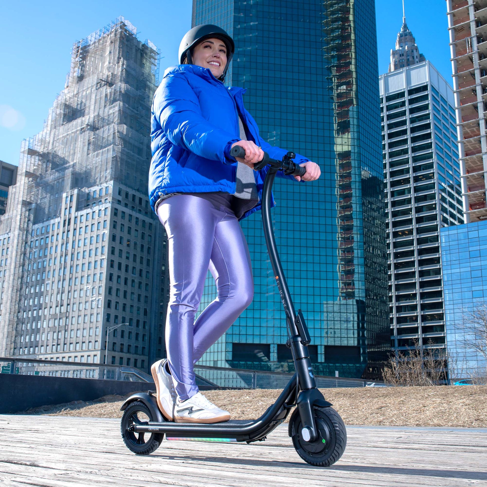 person riding ember electric scooter