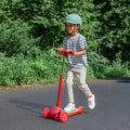 young kid riding halos kick scooter