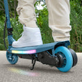 close up of rear wheel and deck on blue joust electric scooter 