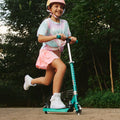 young girl riding Jupiter kick scooter