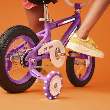 close up of light up training wheels