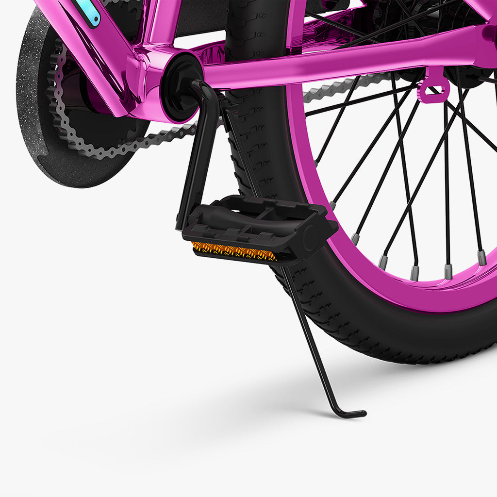 close up of pedal and kickstand on metallic pink light rider 20