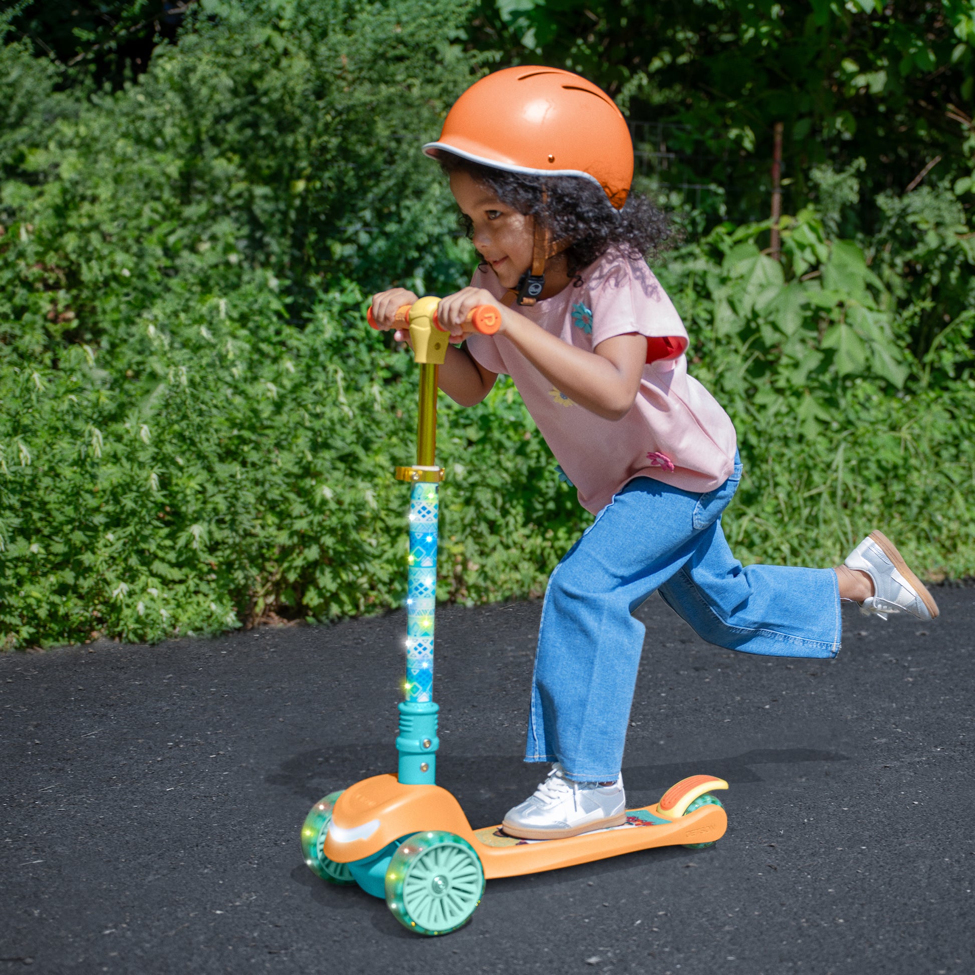 kid riding moana kick scooter