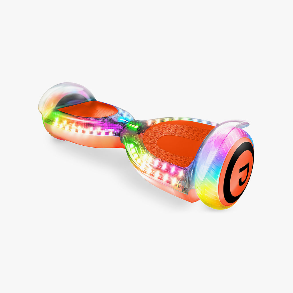 diagonal view of the orange pixel hoverboard with rainbow lights