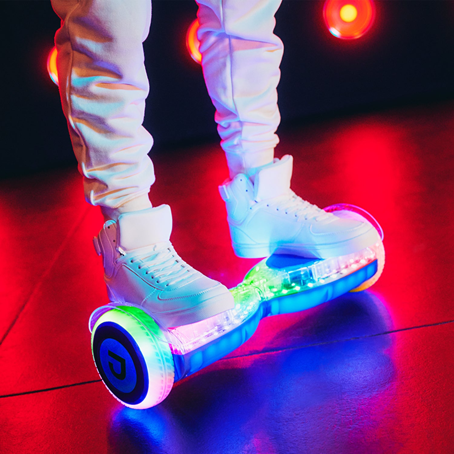 close up of person's feet on the light up pixel hoverboard