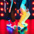 two people riding the light up pixel hoverboard