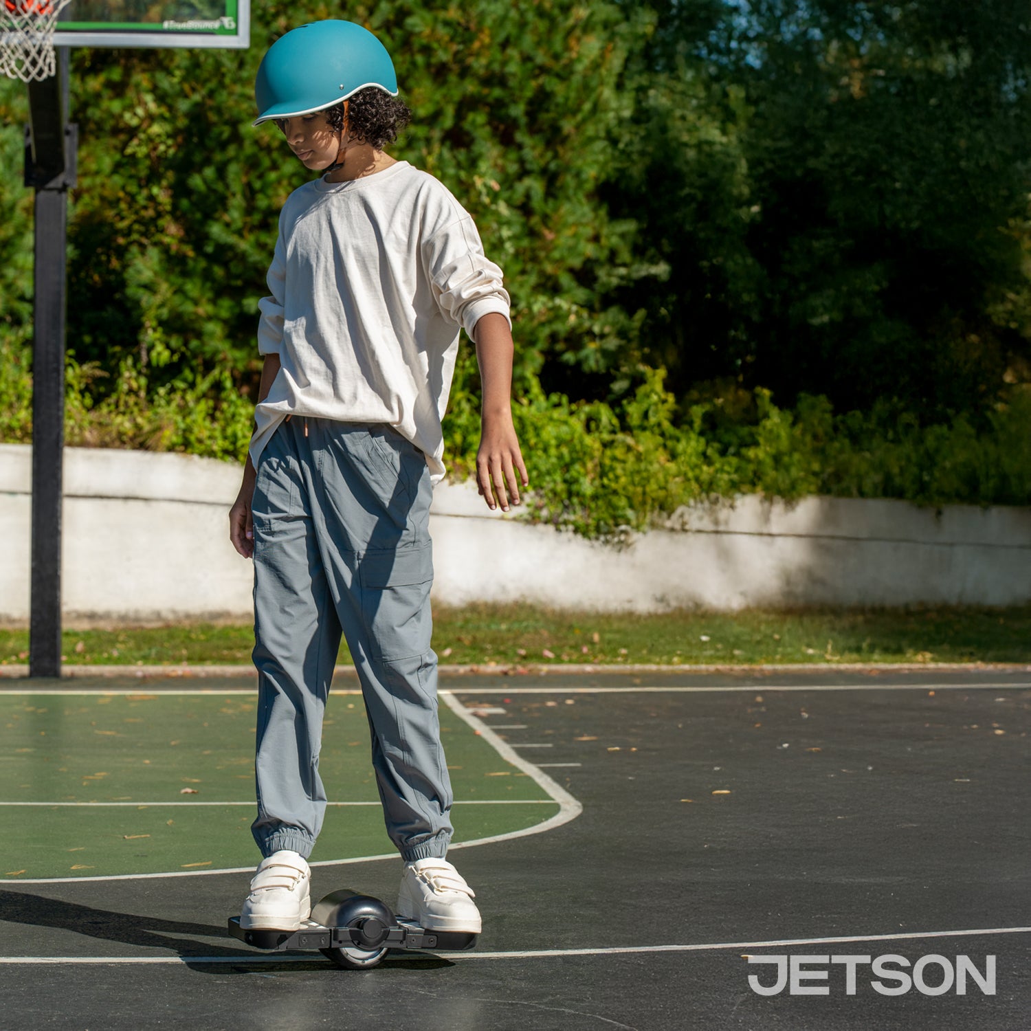 kid riding ring balance board