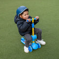 little kid sitting on cocomelon scooter seat