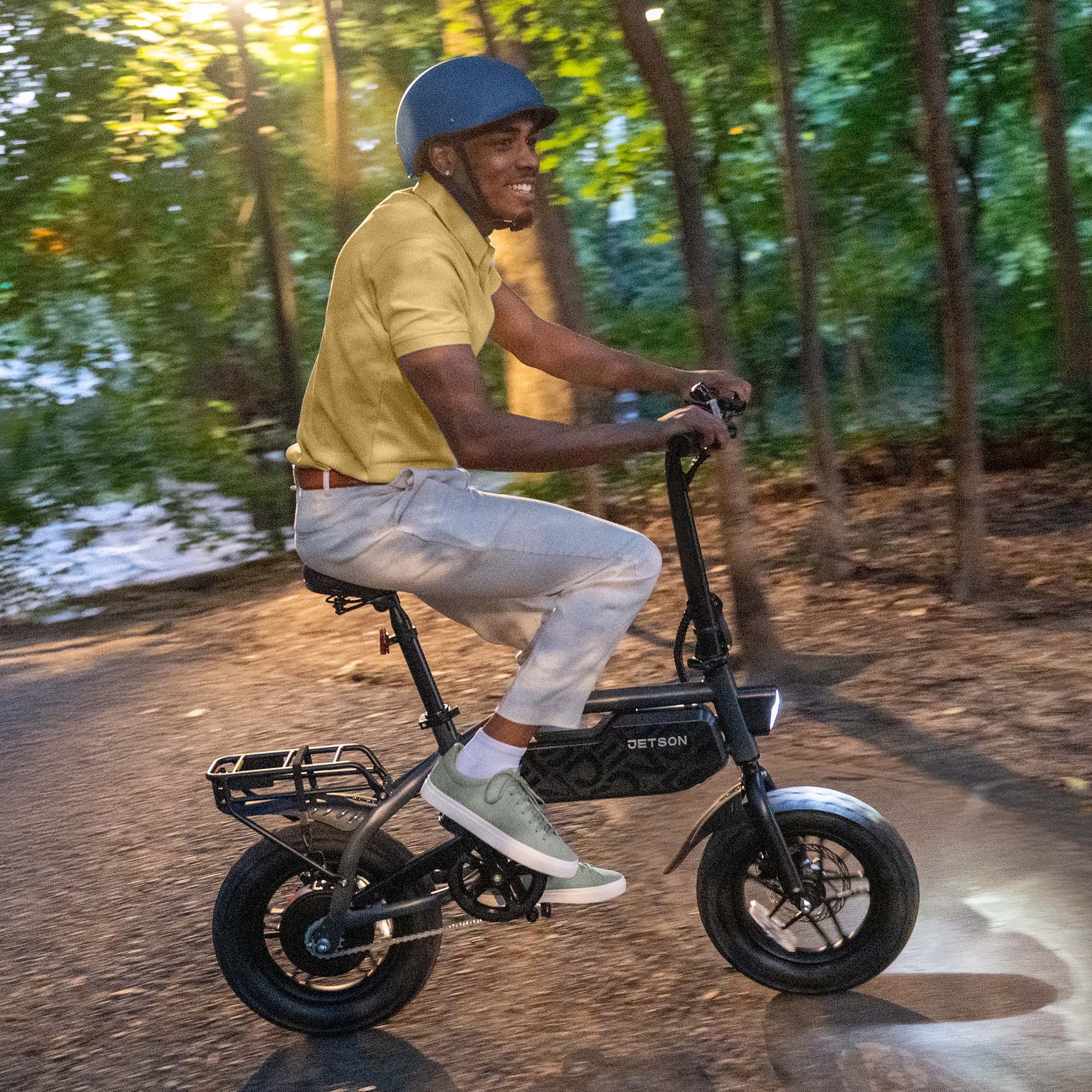 person riding shadow e-bike in the woods
