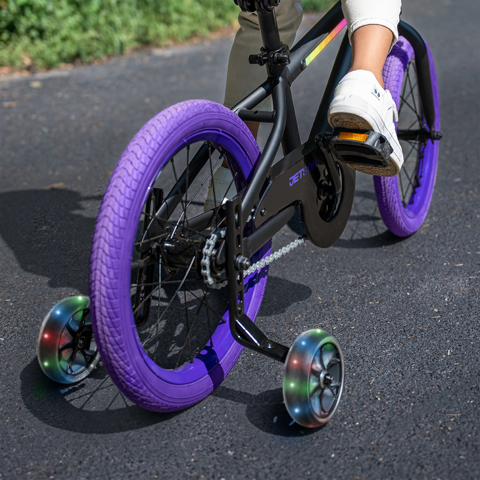 spark training wheels attached to a bike