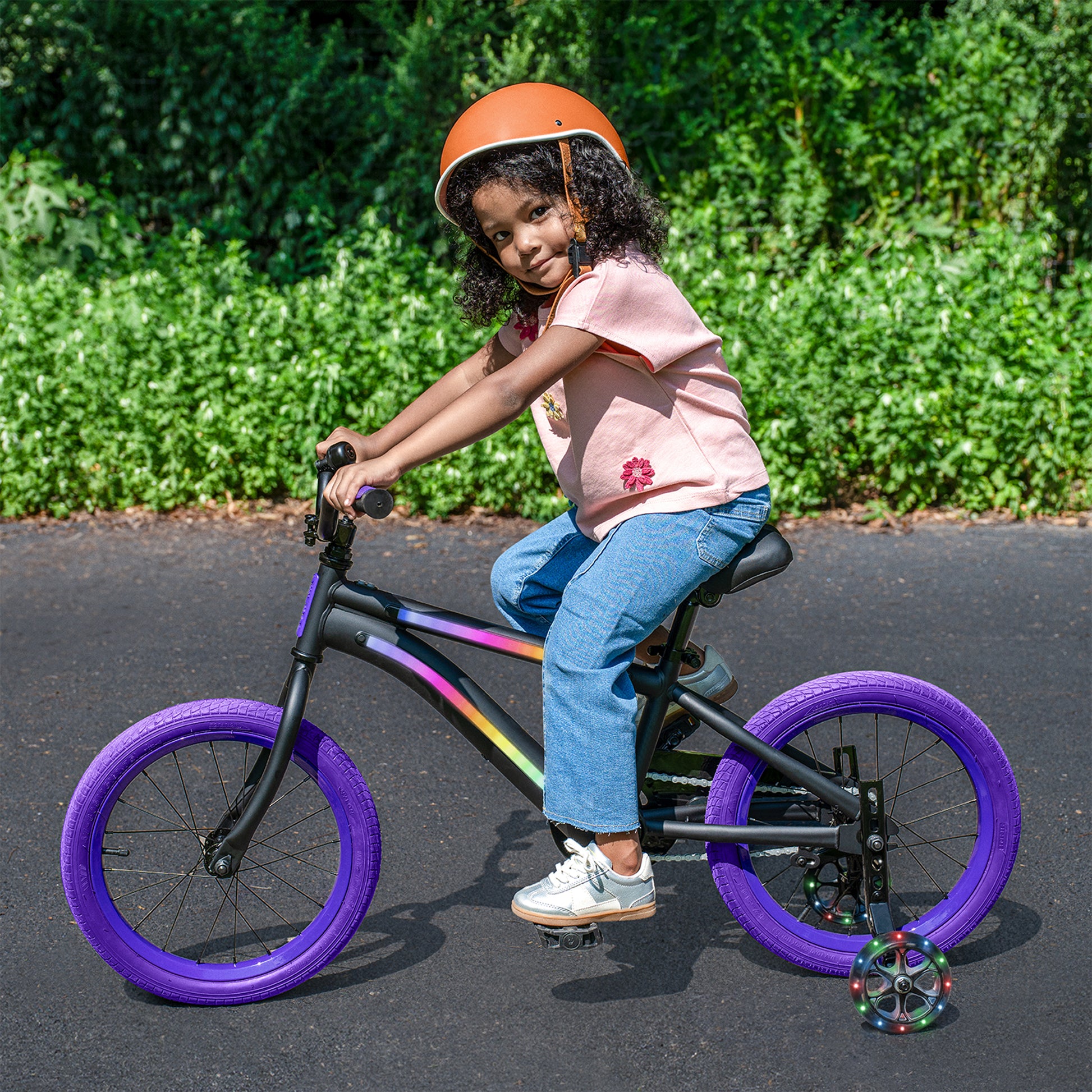 spark training wheels attached to a bike