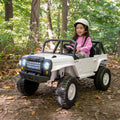 young girl driving vega ride-on