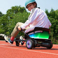 kid smiling at the camera while riding alpha jetkart hoverboard combo