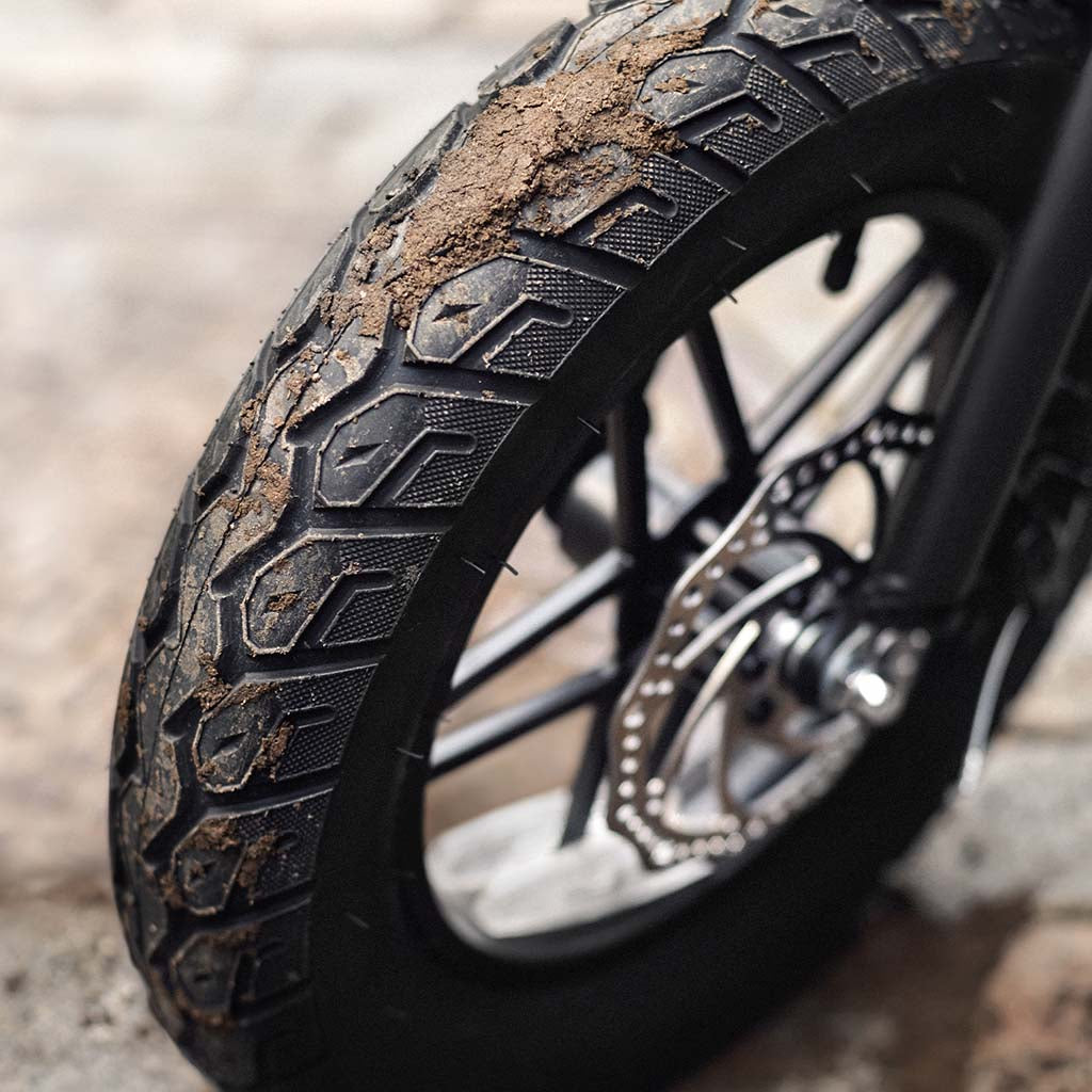 close up of the fat tires on the atlas electric bike