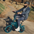 person with a helmet on riding a blue Bolt Pro bike in the park