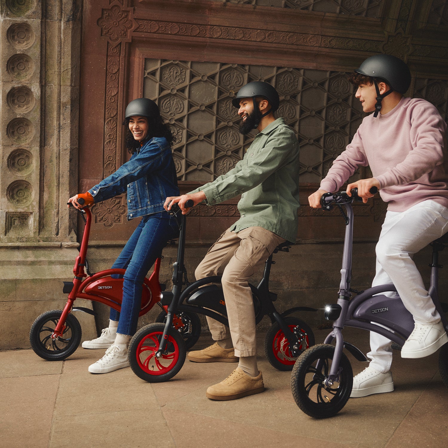 group of three people sitting on three different Bolt bikes 