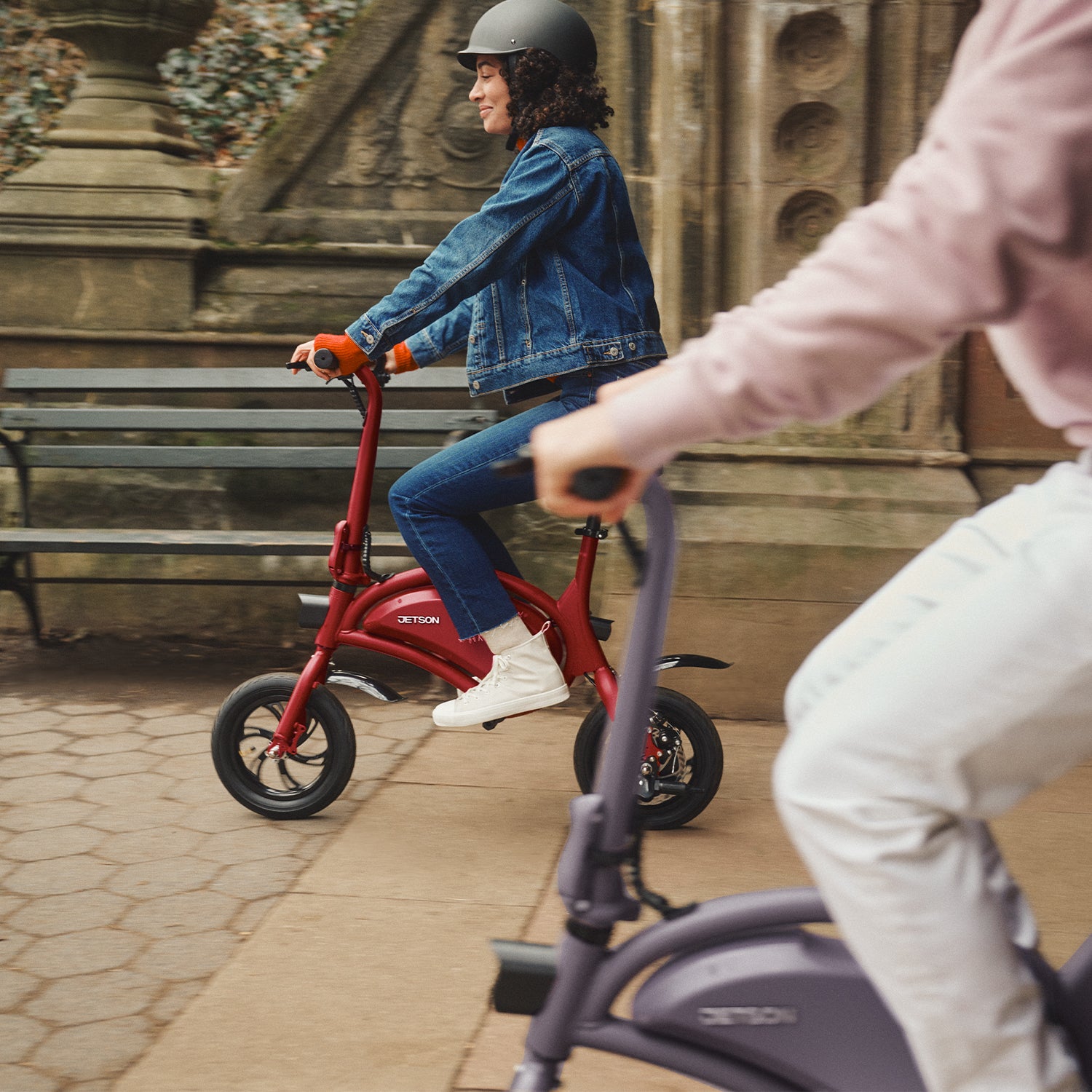 picture of a woman in a helmet riding the crimson Bolt