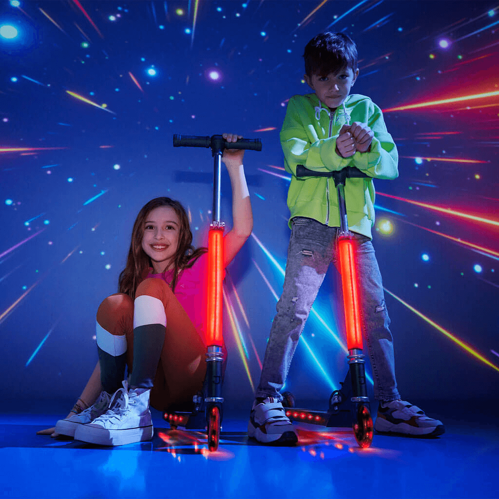 two kids holding onto their light up cosmo kick scooters