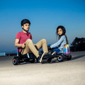 two kids riding the force hoverboard combo