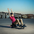 person holding their hands in the air while on the force hoverboard combo