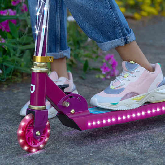close up of front wheel and scooter deck on disney frozen kick scooter