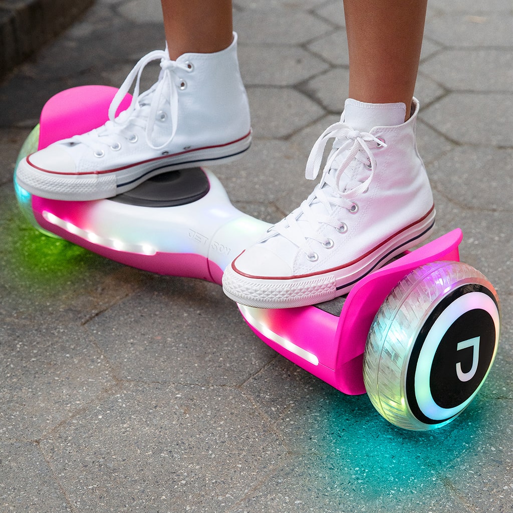 person riding the pink Hali hoverboard
