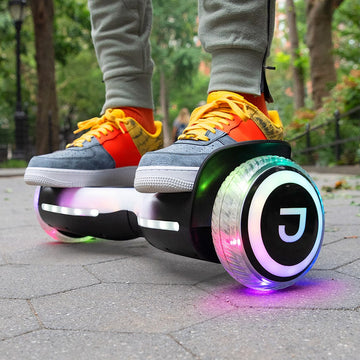 person riding on the black Hali Hoverboard
