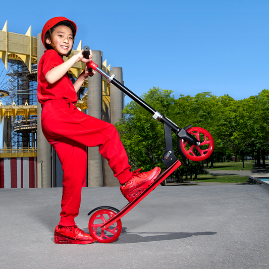 kid posing with the red hex scooter