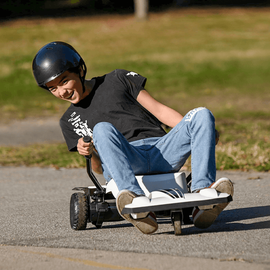 young person riding the Impulse on pavement
