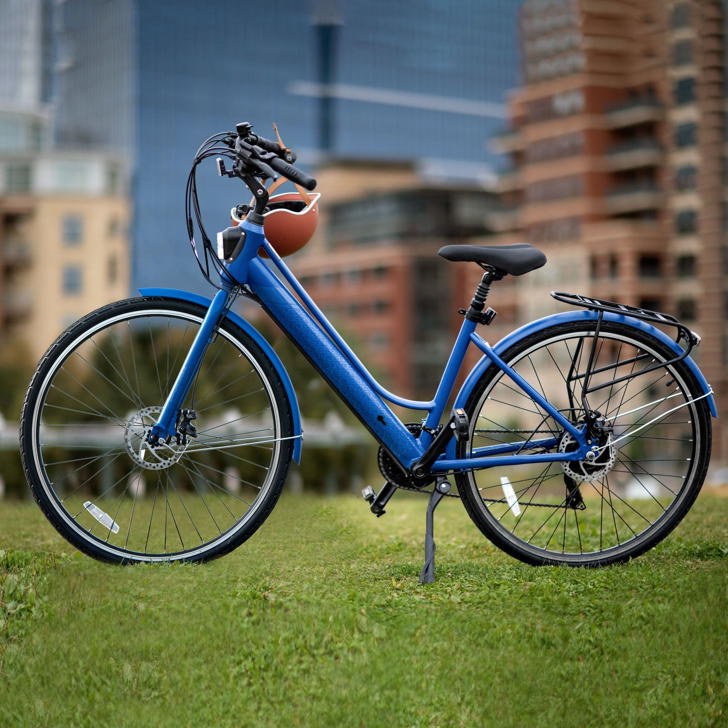 Journey electric bike parked with the kickstand on a grassy field