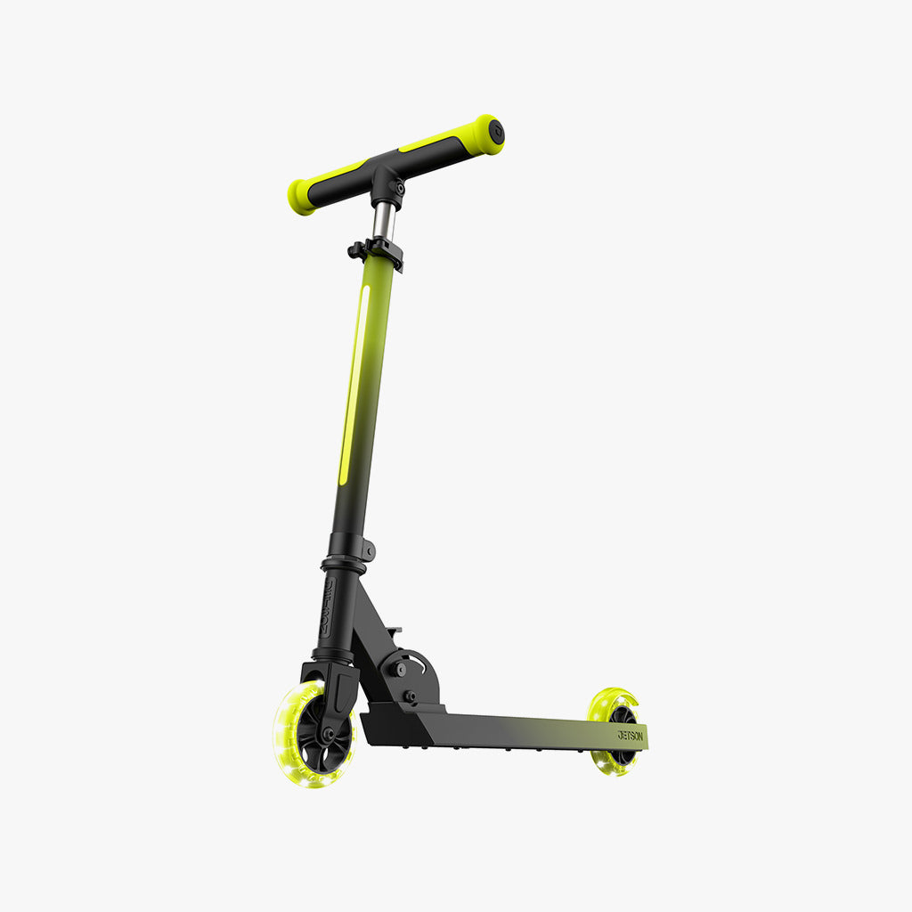 electric yellow juno kick scooter facing on a left diagonal 