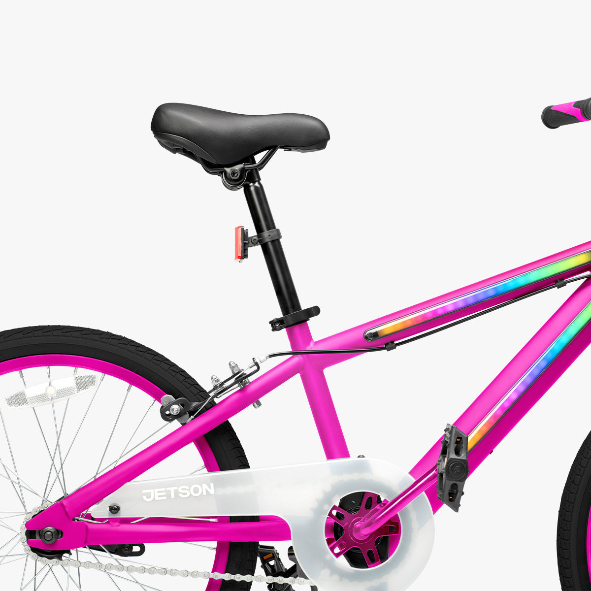 close up of pink JLR X bike with the bike seat extended
