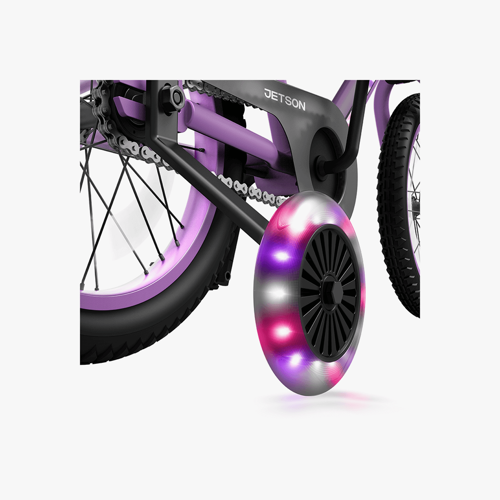 close up of light up training wheels on purple light up bike