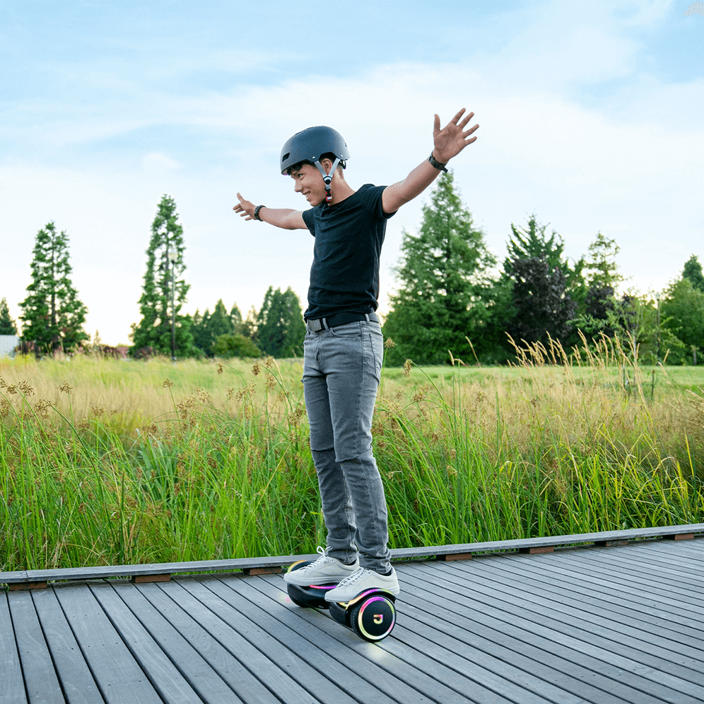 kid on the Magma outdoors next to a grassy area