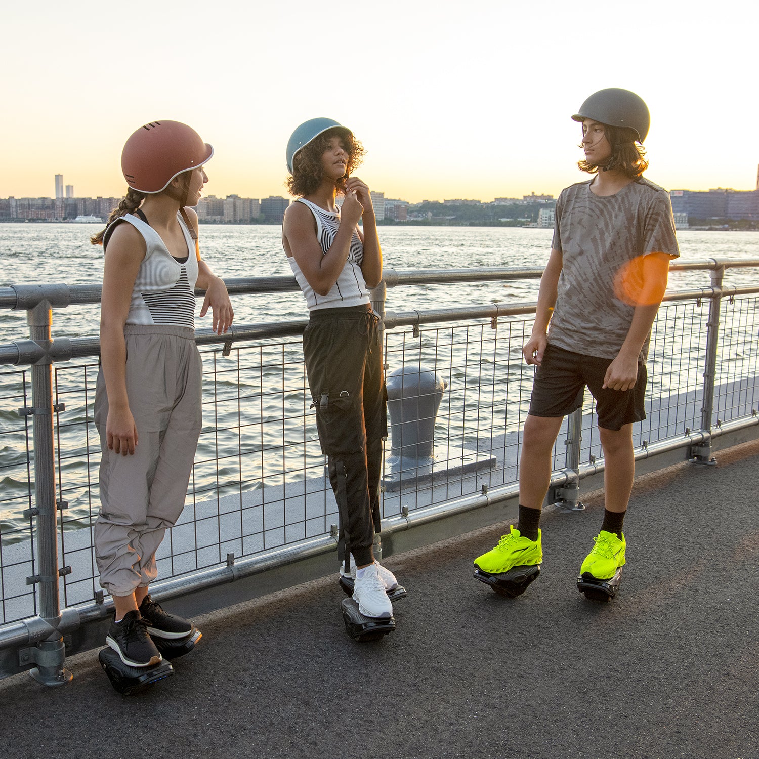 a group of kids at the pier on their MotoKicks