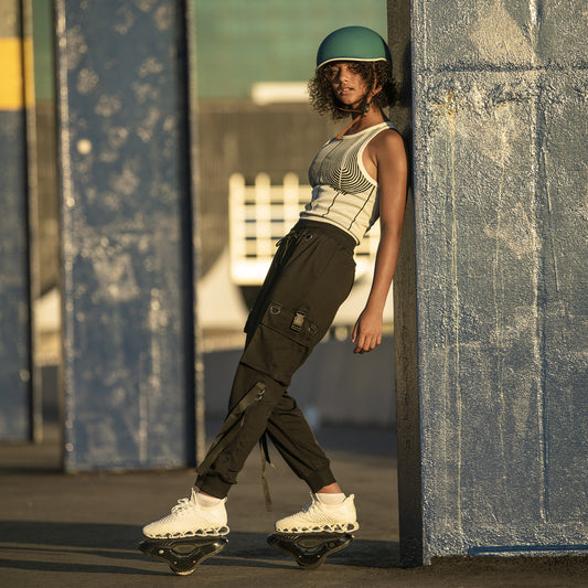 girl in an editorial pose on her MotoKicks