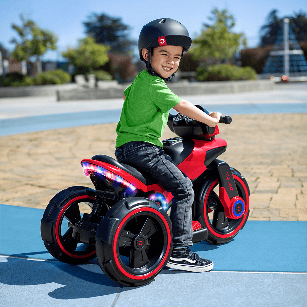 young child sitting on the Trooper Electric Ride On